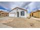 Beautiful home with a two-car garage and low maintenance desert landscaping at 14623 N 90Th Ln, Peoria, AZ 85381