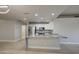 Elegant kitchen features a granite island and modern appliances offering ample counter space at 14623 N 90Th Ln, Peoria, AZ 85381
