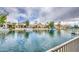 Waterfront homes on a canal, featuring boat docks and beautiful landscaping at 14623 N 90Th Ln, Peoria, AZ 85381