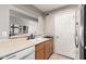 Bright kitchen area offering practical layout, good counter space, and a pass-through window at 16496 N 68Th Ave, Peoria, AZ 85382