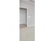 Neutral bedroom with carpet, bright white walls, and white trim at 17767 W Getty Dr, Goodyear, AZ 85338