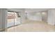 Open living area with sliding glass door access to the backyard at 17770 W Getty Dr, Goodyear, AZ 85338