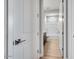 Hallway view to full bathroom showcasing modern fixtures and inviting design at 18147 W Tanglewood Dr, Goodyear, AZ 85338