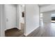 Entryway features wood-look flooring and leads into an open floor plan at 18147 W Tanglewood Dr, Goodyear, AZ 85338