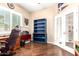 Office features natural light, neutral paint, and hard wood flooring at 18543 W Denton Ave, Litchfield Park, AZ 85340