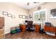 Office with natural light and neutral paint with hard wood flooring at 18543 W Denton Ave, Litchfield Park, AZ 85340