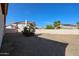 Expansive backyard with desert landscaping, and privacy fence at 2009 N 125Th Ave, Avondale, AZ 85392