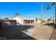 Expansive backyard with a storage shed, desert landscape, and refreshing pool area at 2009 N 125Th Ave, Avondale, AZ 85392