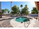 Inviting backyard with an inground pool, desert landscaping, and privacy fence at 2009 N 125Th Ave, Avondale, AZ 85392