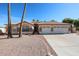 Charming single-story home featuring a well-maintained yard and a spacious three-car garage at 2009 N 125Th Ave, Avondale, AZ 85392
