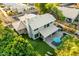 Aerial view of a spacious two-story home with a pool, backyard, and well-maintained landscaping at 21121 N 63Rd Dr, Glendale, AZ 85308