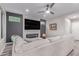 Stylish living room features a plush sofa, a modern fireplace, and contemporary decor at 21121 N 63Rd Dr, Glendale, AZ 85308