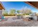 Inviting backyard featuring a brick patio with built-in grill, offering a delightful outdoor cooking experience at 22324 W Magnolia St, Buckeye, AZ 85326