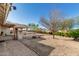 Lush backyard with a built-in grill area, perfect for outdoor entertaining and enjoying the outdoors at 22324 W Magnolia St, Buckeye, AZ 85326