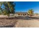 Charming single-story home with desert landscaping and a covered front porch perfect for relaxing at 22324 W Magnolia St, Buckeye, AZ 85326