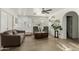 Inviting living room with neutral walls, abundant natural light, and a comfortable seating arrangement at 22324 W Magnolia St, Buckeye, AZ 85326