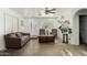 Inviting living room with neutral walls, abundant natural light, and a comfortable seating arrangement at 22324 W Magnolia St, Buckeye, AZ 85326