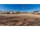 Open lot area with utilities, offering ample space for development and various potential uses at 22324 W Magnolia St, Buckeye, AZ 85326