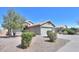 Lovely single-story home featuring low-maintenance desert landscaping and a tile roof at 2384 E Santiago Trl, Casa Grande, AZ 85194