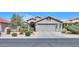 Charming single-story home with a well-manicured lawn and inviting curb appeal at 2384 E Santiago Trl, Casa Grande, AZ 85194