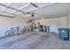 Spacious two car garage with bikes, storage, and water heater at 2464 E Hancock Trl, Casa Grande, AZ 85194
