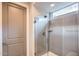 Bathroom shower with frameless glass door and modern fixtures at 25920 W Westcott Dr, Buckeye, AZ 85396