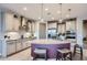 Beautiful kitchen featuring granite countertops, a kitchen island, and stainless steel appliances at 25920 W Westcott Dr, Buckeye, AZ 85396