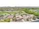 Aerial view of the home featuring the golf course view and mature landscaping at 27688 N 125Th Dr, Peoria, AZ 85383