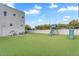 Large backyard with lush green grass and playground at 3675 N 59Th Pl, Phoenix, AZ 85018