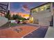 Beautiful home backyard featuring a basketball court and outdoor lounge area, perfect for Gathering fun and entertaining at 3675 N 59Th Pl, Phoenix, AZ 85018