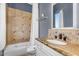 Bathroom features vanity, shower-tub combo and granite countertops at 3675 N 59Th Pl, Phoenix, AZ 85018