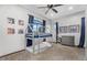Bedroom features bunk beds, ceiling fan, and sports themed decor at 3675 N 59Th Pl, Phoenix, AZ 85018