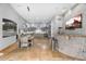 Spacious kitchen with a large island, modern appliances, and adjacent dining area at 3675 N 59Th Pl, Phoenix, AZ 85018