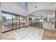 Open-concept living area with seamless indoor-outdoor flow, leading to an outdoor kitchen and seating at 3675 N 59Th Pl, Phoenix, AZ 85018
