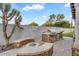 Elegant outdoor kitchen with a built-in grill, perfect for outdoor entertaining and enjoying the beautiful surroundings at 3675 N 59Th Pl, Phoenix, AZ 85018
