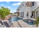 Inviting pool and spa area with stylish patio furniture, perfect for relaxation and outdoor entertaining at 3675 N 59Th Pl, Phoenix, AZ 85018