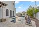 Stunning pool area with water features and comfortable seating, creating a serene and inviting outdoor space at 3675 N 59Th Pl, Phoenix, AZ 85018
