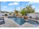 Beautiful pool with a water feature and comfortable seating for outdoor relaxation at 3675 N 59Th Pl, Phoenix, AZ 85018