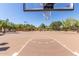 Well-maintained basketball court with hoops, painted lines, and ample space for sports and recreation at 3816 E Expedition Way, Phoenix, AZ 85050