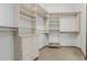 This closet features custom shelving, drawers, and hanging rods at 3816 E Expedition Way, Phoenix, AZ 85050