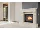 Close up of a modern fireplace featured in a living room, the room has a back door for easy access at 3816 E Expedition Way, Phoenix, AZ 85050