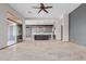 Bright living room view into the kitchen and features tan tiled flooring at 3816 E Expedition Way, Phoenix, AZ 85050