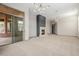 Open-concept living room featuring a stylish fireplace and seamless access to the outdoor patio at 3816 E Expedition Way, Phoenix, AZ 85050