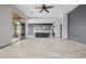 Open-concept living space flows into kitchen, complemented by travertine floors and plenty of room at 3816 E Expedition Way, Phoenix, AZ 85050