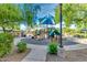 Community playground featuring swings, slides, and other play equipment for enjoyment and outdoor activities at 3816 E Expedition Way, Phoenix, AZ 85050