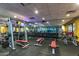 Weight room featuring weight machines, free weights, and mirrored walls for a complete workout experience at 3816 E Expedition Way, Phoenix, AZ 85050
