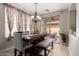 Dining room featuring a rustic table, bench seating, and sliding glass door to the patio at 3940 E Geronimo St, Gilbert, AZ 85295