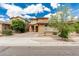 Two-story home featuring a tile roof, neutral stucco exterior, and well-maintained landscaping at 3940 E Geronimo St, Gilbert, AZ 85295