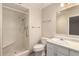 Bathroom featuring a walk-in shower, toilet, and single sink at 4158 E Crescent Ave, Mesa, AZ 85206