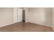 Bedroom featuring tiled flooring, neutral walls, and closet with door at 4158 E Crescent Ave, Mesa, AZ 85206